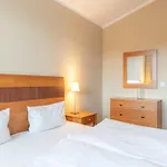 In A Lakeside Park In With A Balcony Apartment