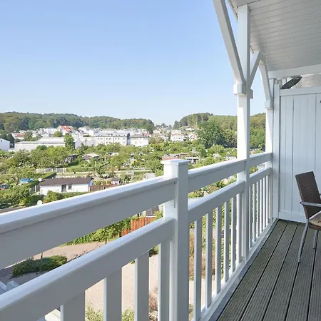 In A Lakeside Park In With A Balcony *