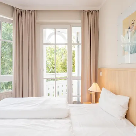 In A Lakeside Park In With A Balcony *