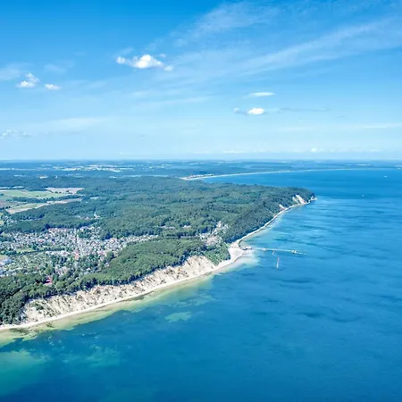 In A Lakeside Park In With A Balcony