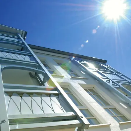 In A Lakeside Park In With A Balcony