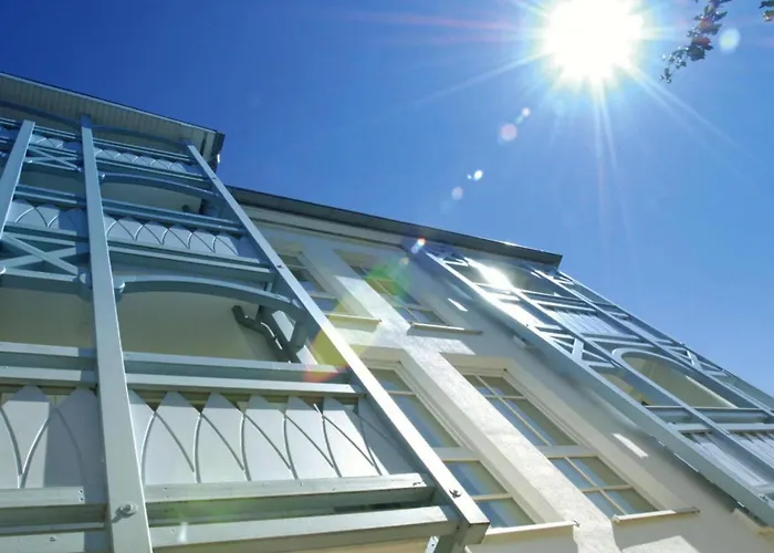 In A Lakeside Park In With A Balcony